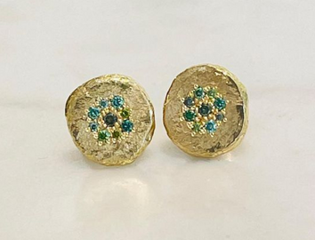 Earrings in 18k gold with green diamonds
