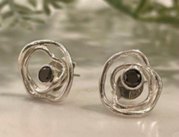 Earrings in silver with black diamonds